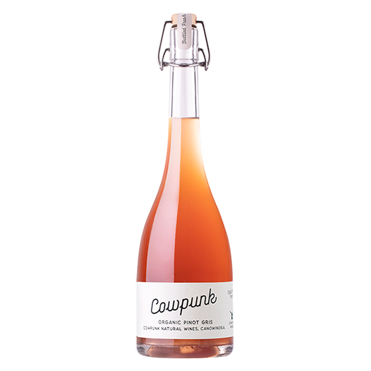 Cowpunk Natural Pinot Gris with floral, blood orange, and amaro notes in a rich, full-bodied style.