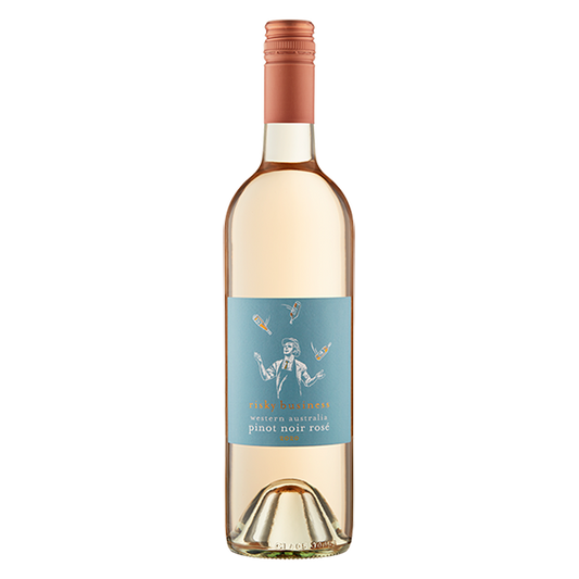 Risky Business Rosé, a pale salmon pink wine with ripe strawberry notes, smooth texture, and crisp acidity.