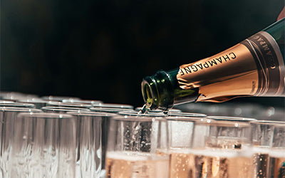 Explore premium sparkling wines, from Champagne to Prosecco. Perfect for celebrations and special occasions. Buy sparkling wine online at VinoClock. Photo by Tristan Gassert on Unsplash.